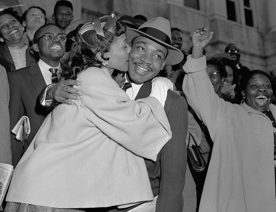 King is welcomed with a kiss from his wife, Coretta Scott King, after leaving court in Montgomery, AL, on March 22, 1956