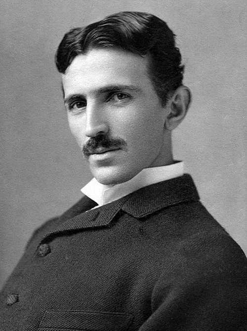A photograph image of Nikola Tesla (1856-1943) at age 34.